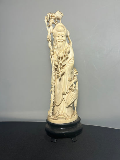 A Japanese Hand Carved Ivory Figure Of a Wise Man