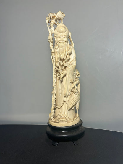 A Japanese Hand Carved Ivory Figure Of a Wise Man