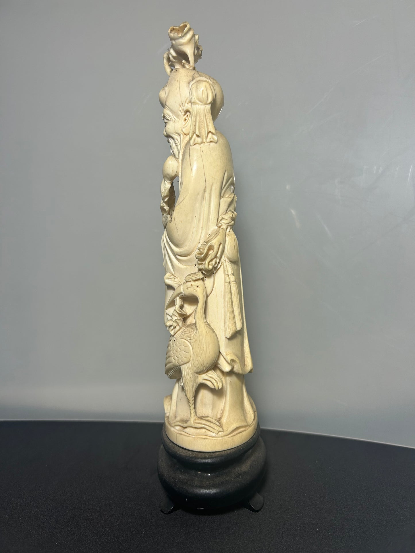 A Japanese Hand Carved Ivory Figure Of a Wise Man