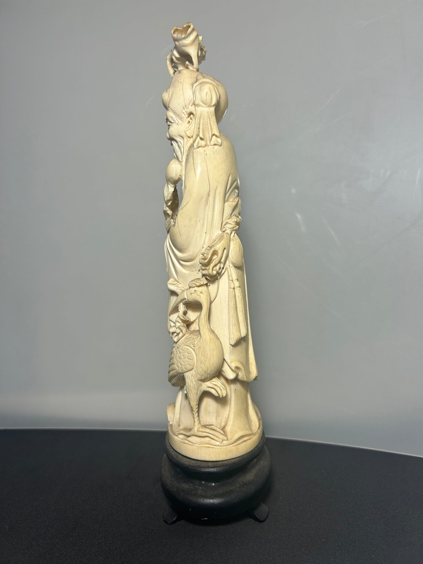 A Japanese Hand Carved Ivory Figure Of a Wise Man